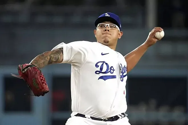 Julio Urias and Daisy Perez attend the Los Angeles Dodgers News